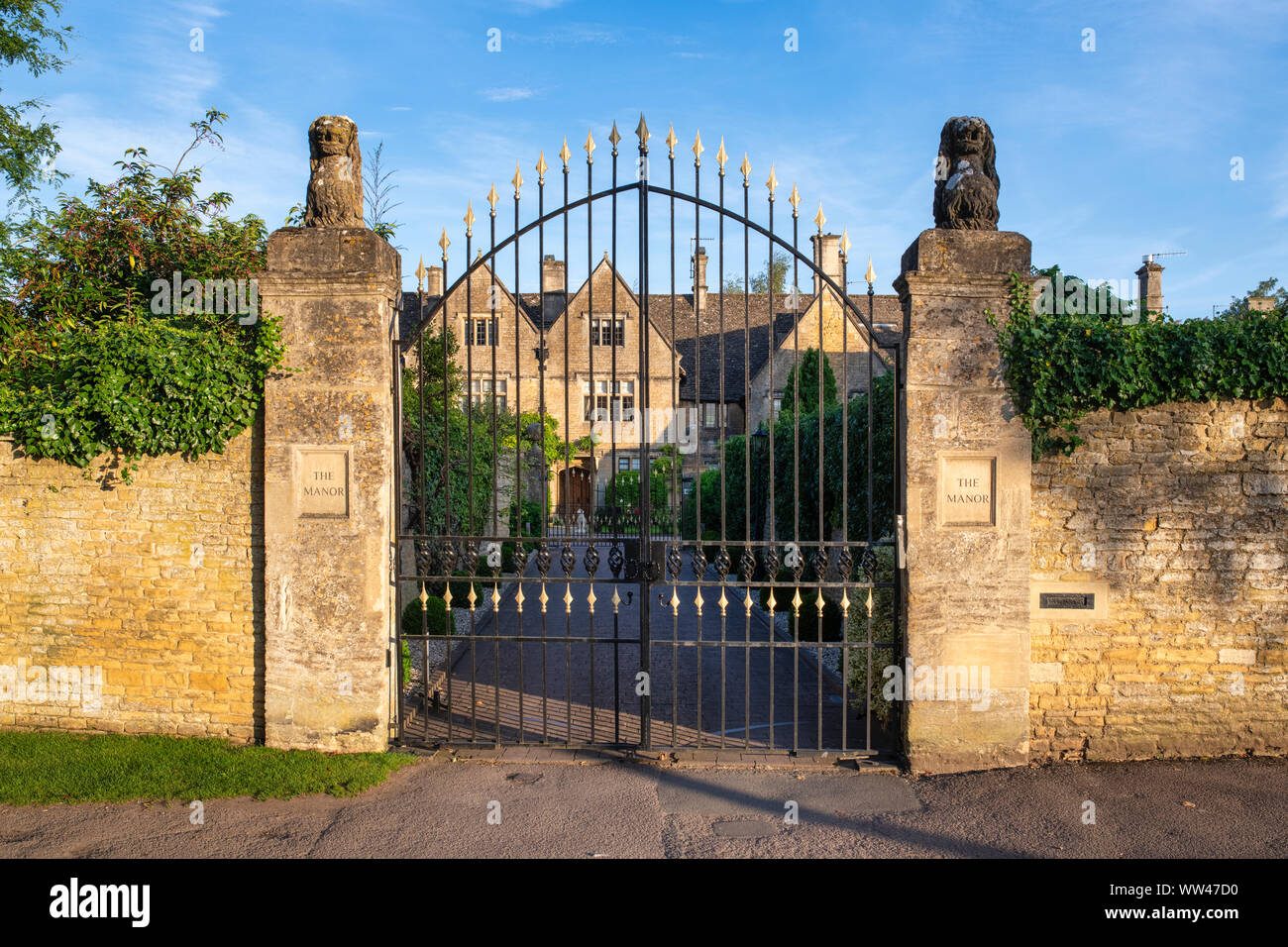 Sunrise light on The Manor, Bourton on the Water, Cotswolds, Gloucestershire, England Stock Photo