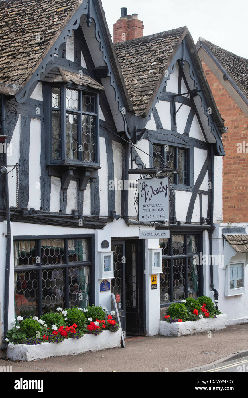 The Wesley House Restaurant. Medieval half timbered building in the ancient Anglo Saxon town of Winchcombe, Cotswolds, Gloucestershire, England Stock Photo