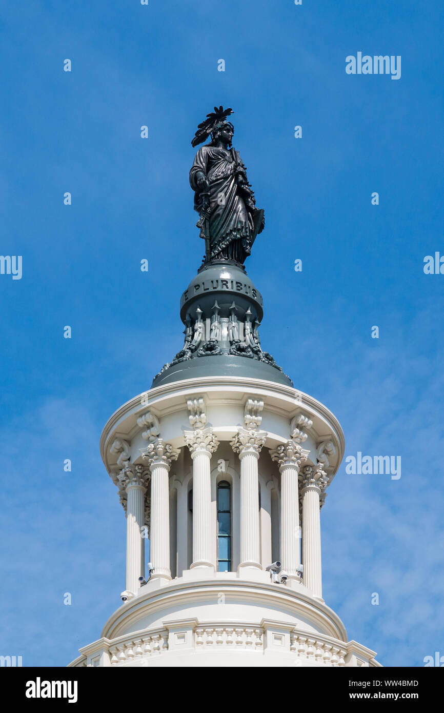 The Statue of Freedom, also known as Armed Freedom , a bronze statue designed by Thomas Crawford and which crowns the dome of the U.S. Capitol. Stock Photo