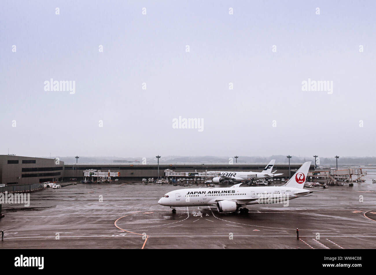 DEC 6, 2018 Narita, Japan Airplane during raining bad weather at