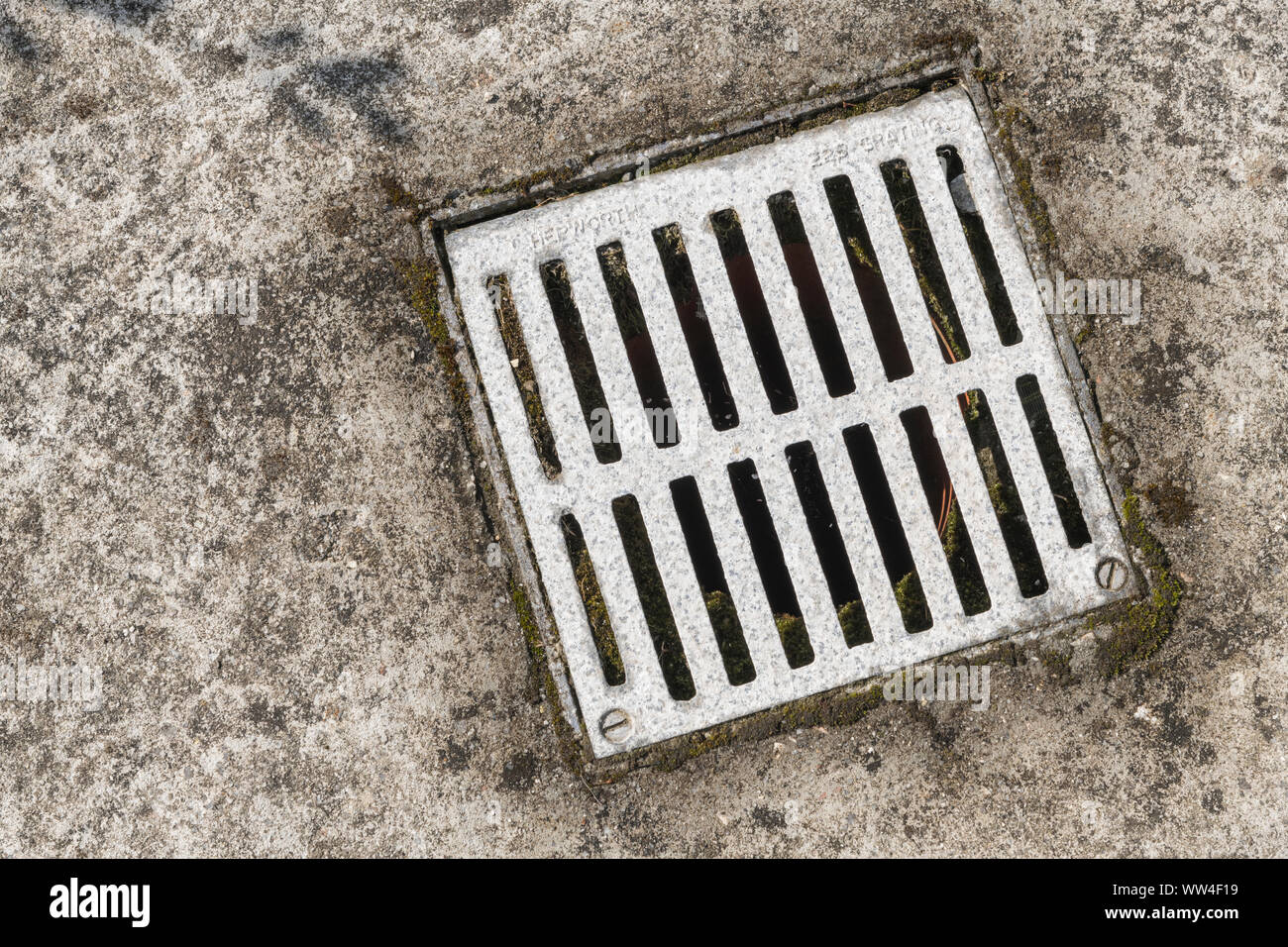 Metal Drain Cover (name Of Manufacturer Embossed Faintly) Set In An ...