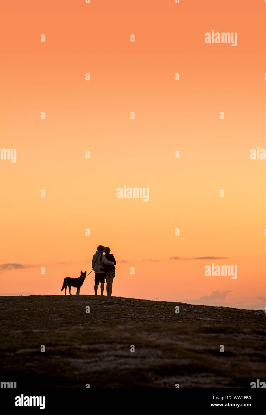 Man woman dog silhouette hi-res stock photography and images - Alamy