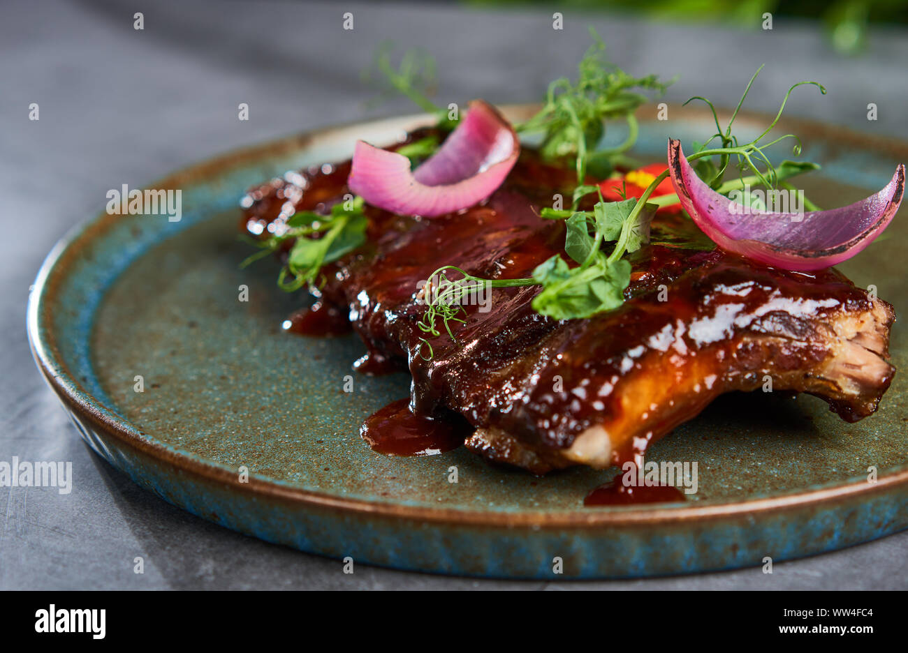 delicious ribs with sauce on a plate Stock Photo