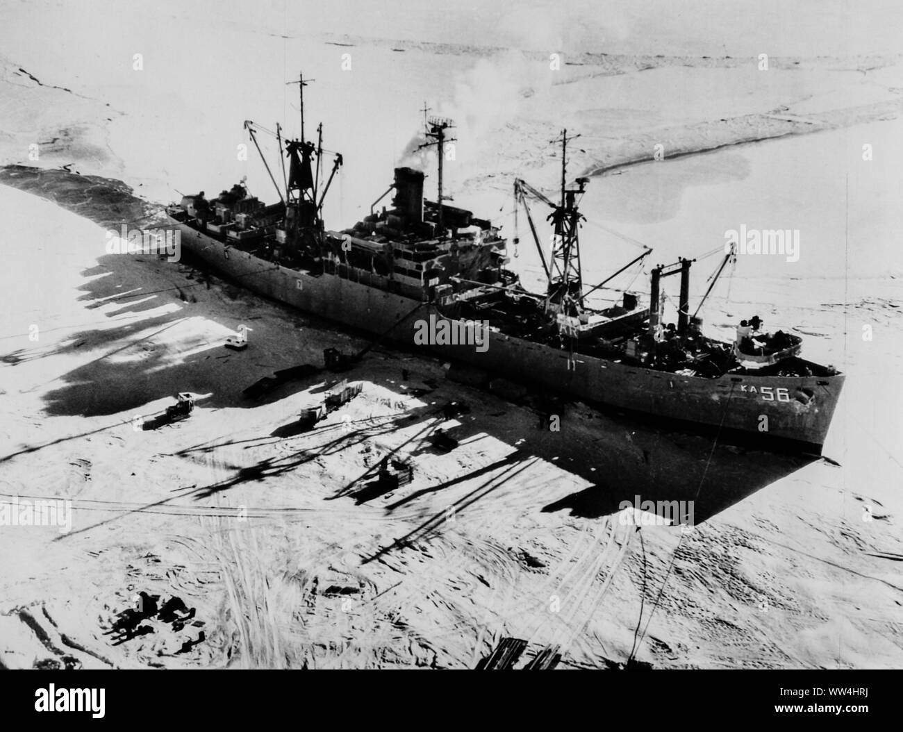 The U.S. Navy attack cargo ship USS Arneb (AKA56) in Antarctica during