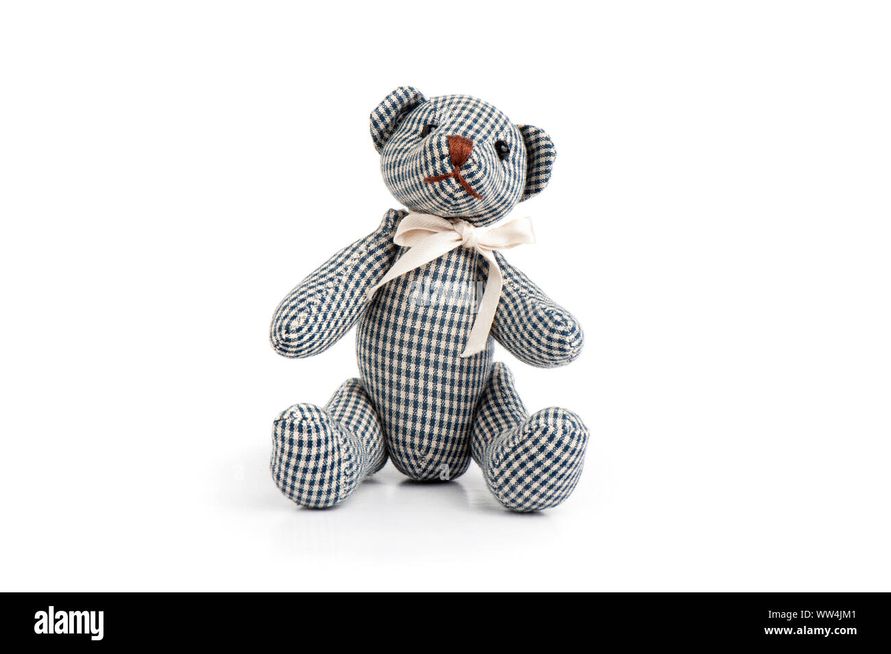 Cute teddy bear isolated over white background Stock Photo