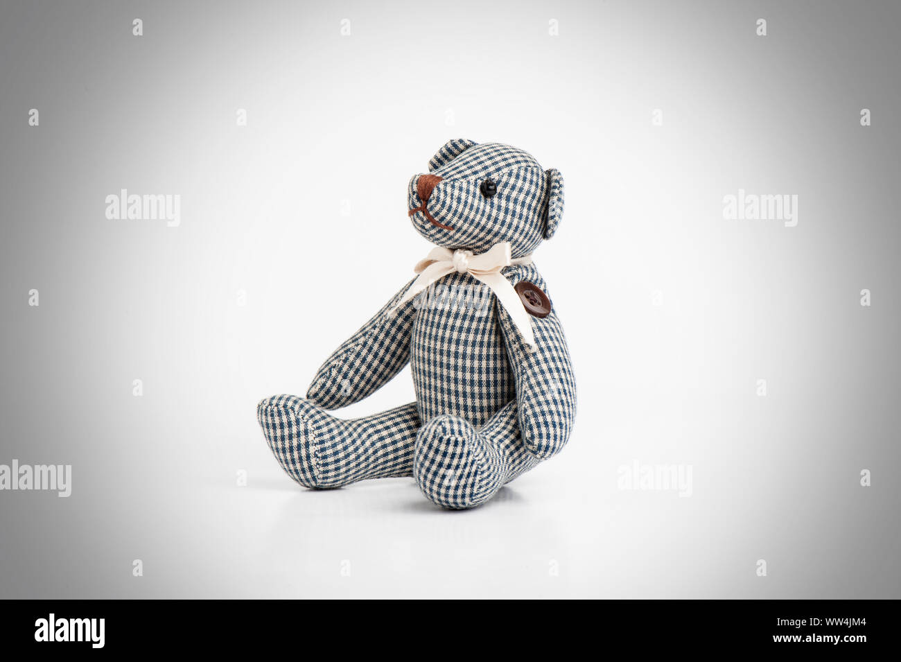 Cute teddy bear isolated over white background Stock Photo - Alamy