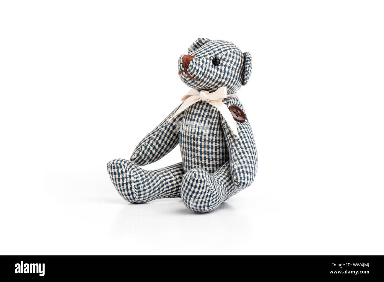 Cute teddy bear isolated over white background Stock Photo - Alamy