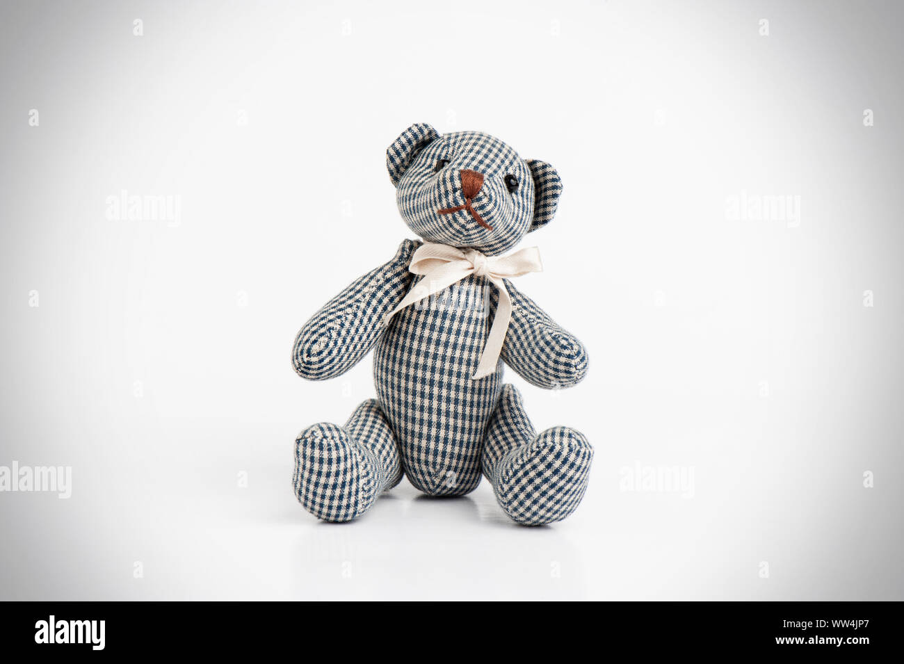 Cute teddy bear isolated over white background Stock Photo - Alamy