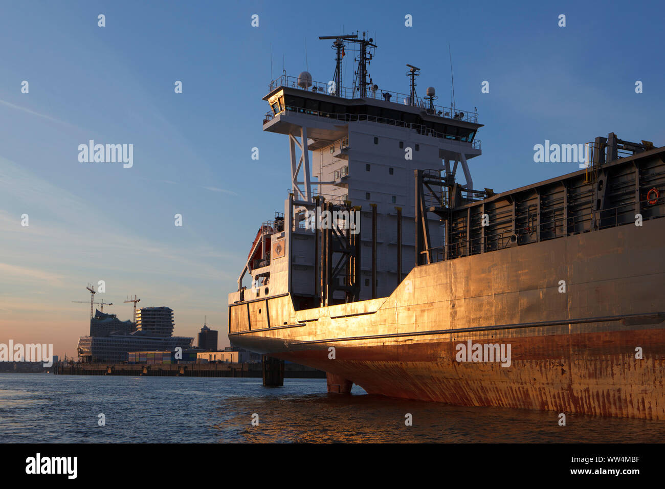 Feeder ship on Northern Elbe. Canal trip Hamburg. Stock Photo