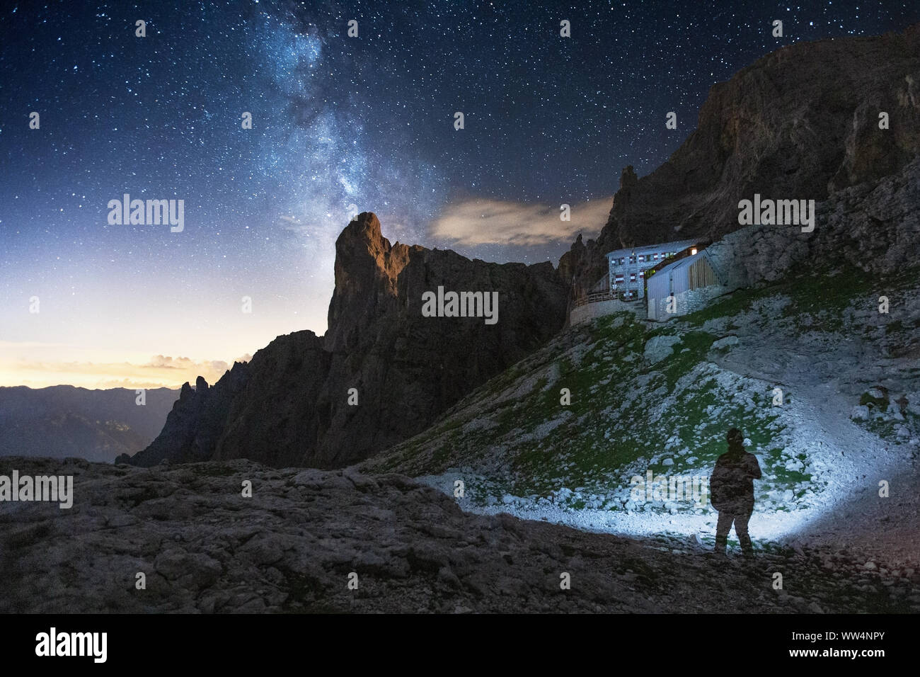 The Pale di San Martino group, Sass Maor peak. Milky Way and starry sky. The Pradidali refuge, alpine bivouac. The Dolomites, Trentino, Italian Alps. Stock Photo