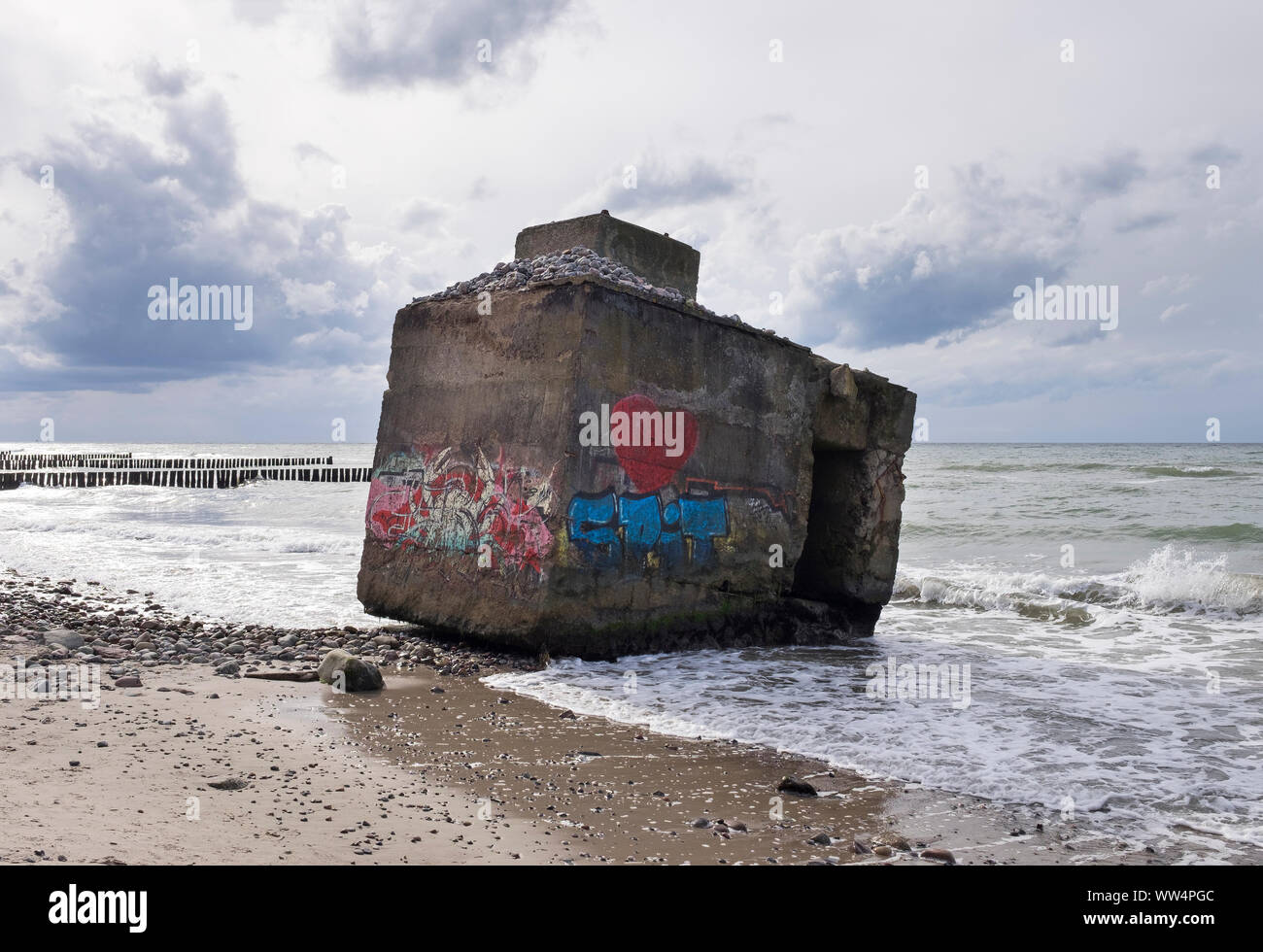 bunkers painted with graffiti on Baltic coast, Hohes Ufer between Wustrow and Ahrenshoop, Fischland, Fischland-DarÃŸ-Zingst, Mecklenburg-West Pomerania, Germany Stock Photo