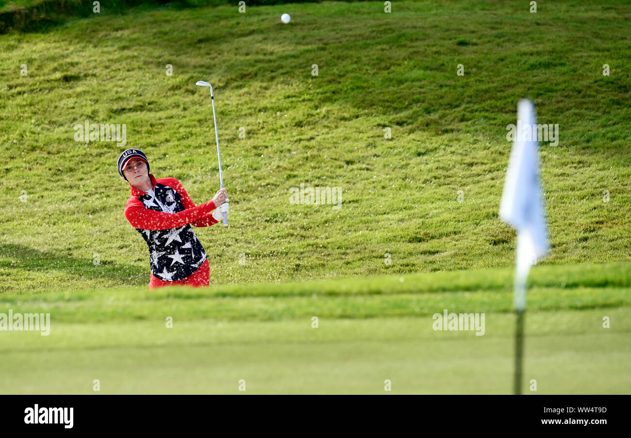 Team USA's Brittany Altomare chips out of a bunker on the 4th during the Foursomes match on day one of the 2019 Solheim Cup at Gleneagles Golf Club, Auchterarder. Stock Photo