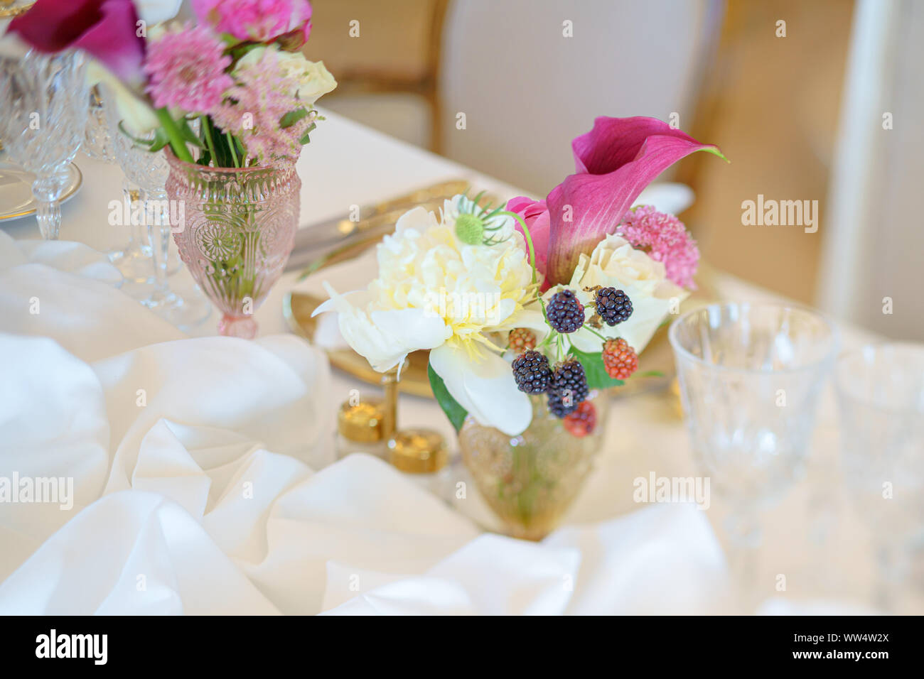 Catering table set service with silverware, napkin and glass at