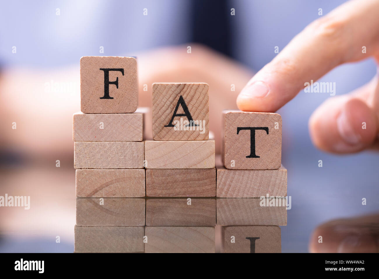 Reduce Fat Concept. Wooden Blocks In Declining Chart Stock Photo