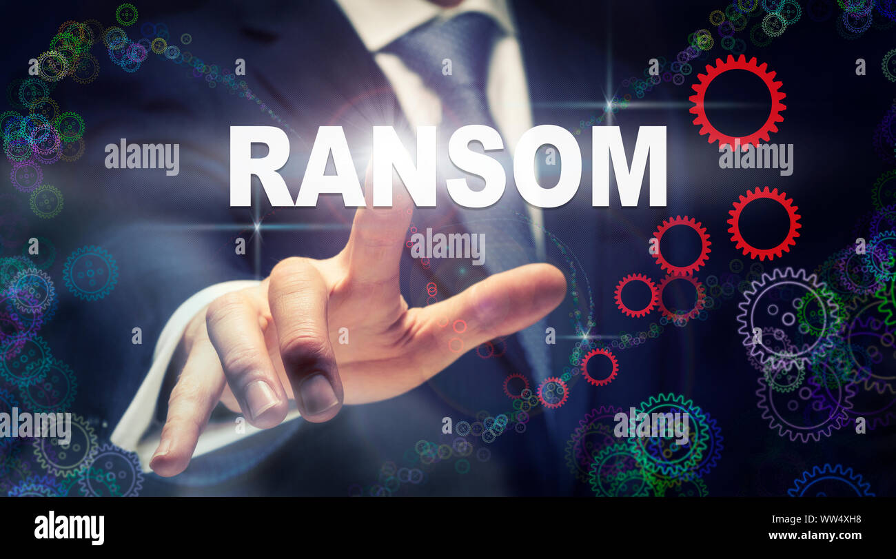 A businessman pressing a Ransom business concept on a graphical display ...