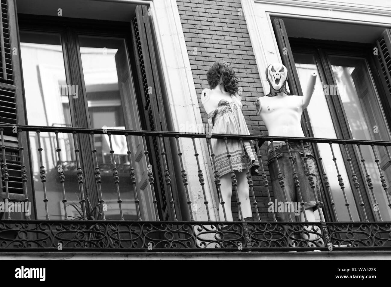 Strange figures on a balcony, Stock Photo