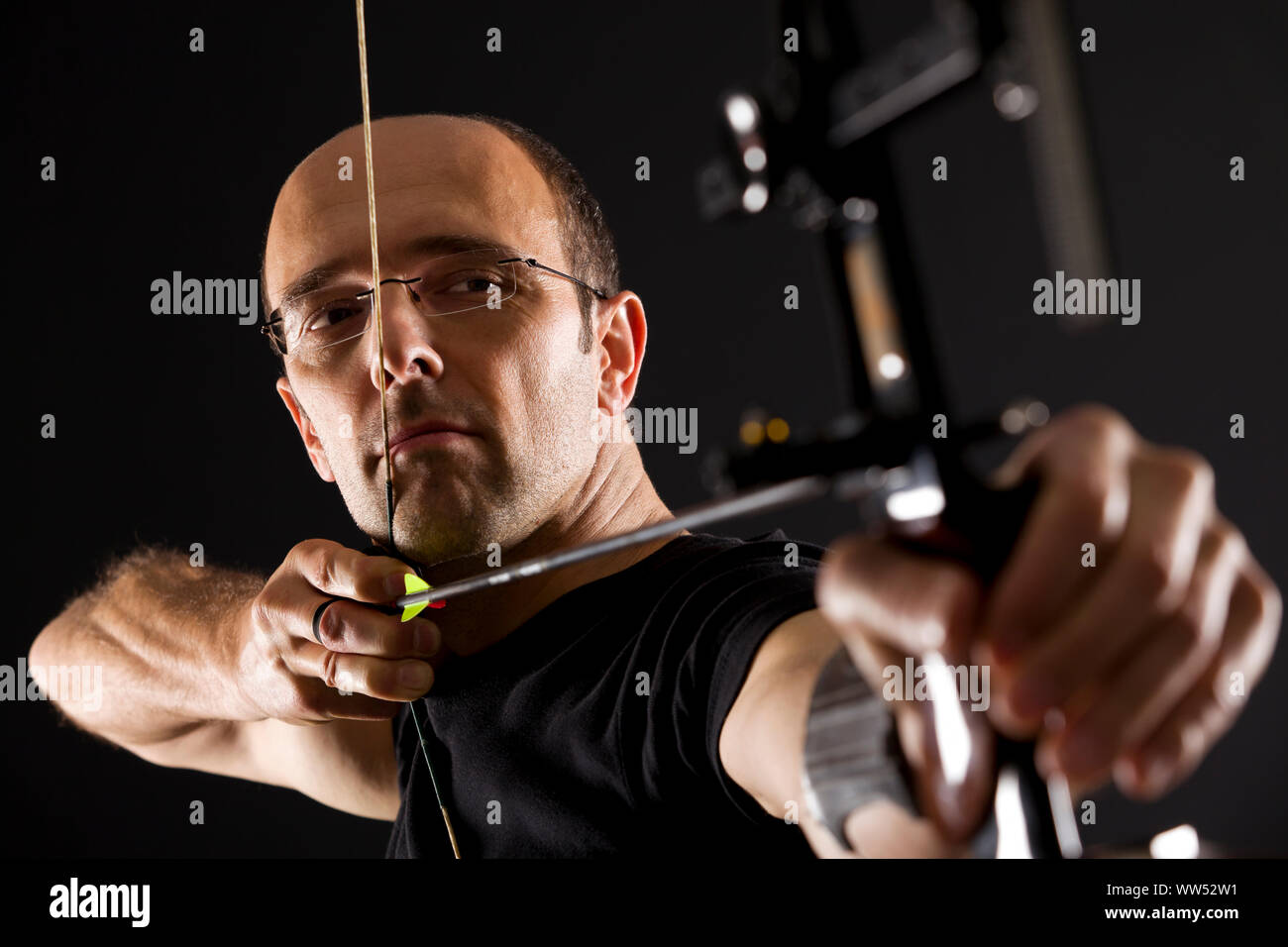 Male archer aiming hi-res stock photography and images - Alamy