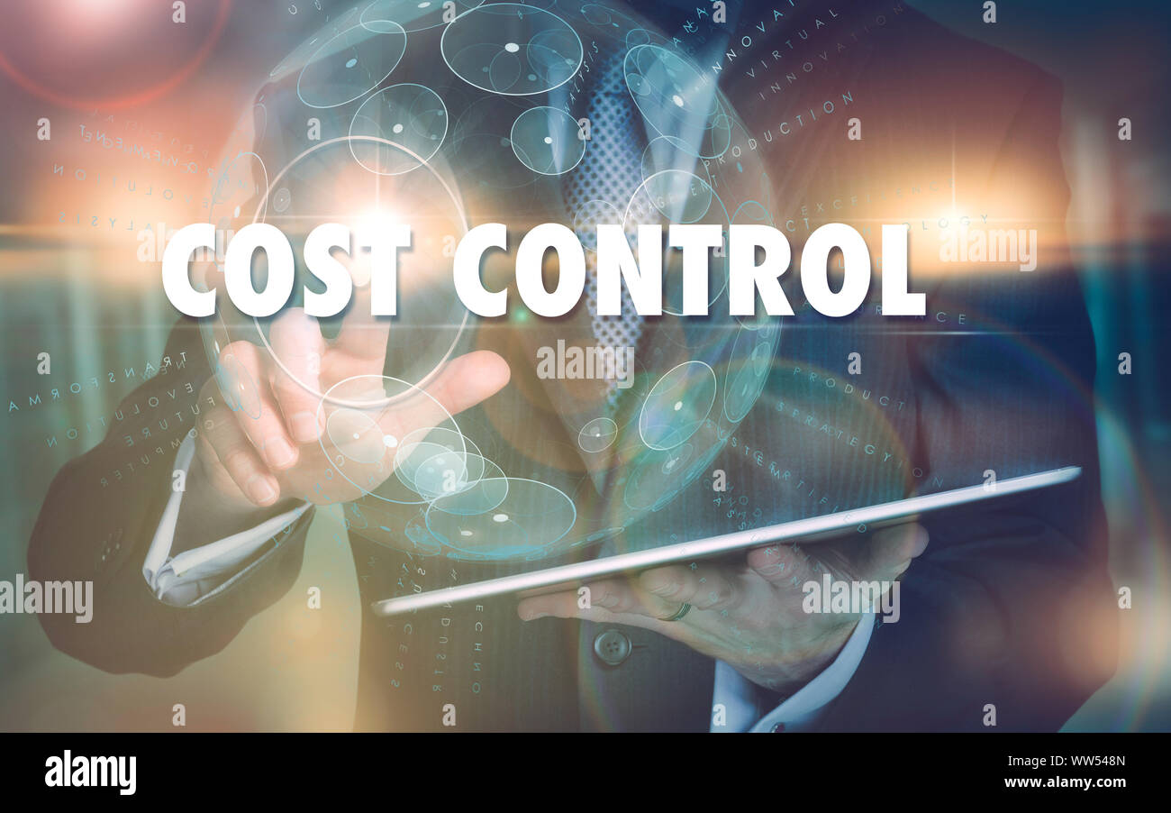 A hand selecting a Cost Control business concept on a futuristic computer display Stock Photo