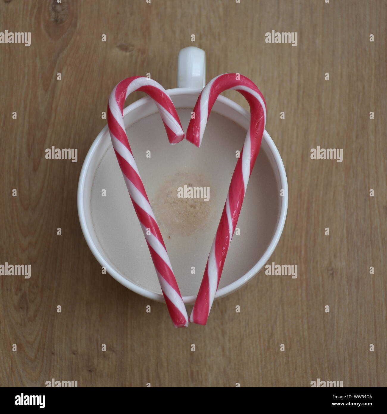 Christmas flat lay with coffee cup and candy cane Stock Photo