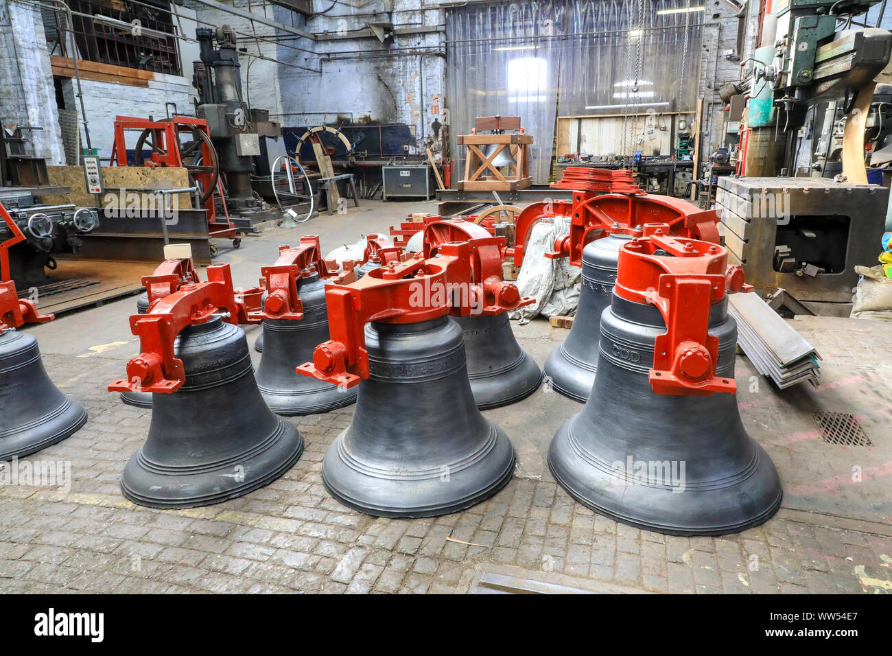 Bells on the shop floor in the workshop of John Taylor & Company Bell Foundry, Loughborough, Leicestershire, England, UK Stock Photo