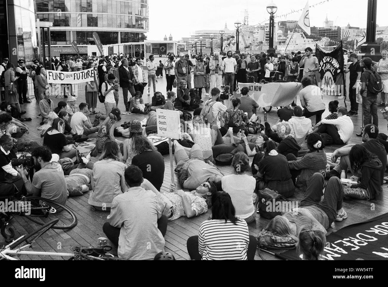 The Extinction Rebellion protest group listening to a speaker outside City Hall, London, on the 18th July 2019 Stock Photo