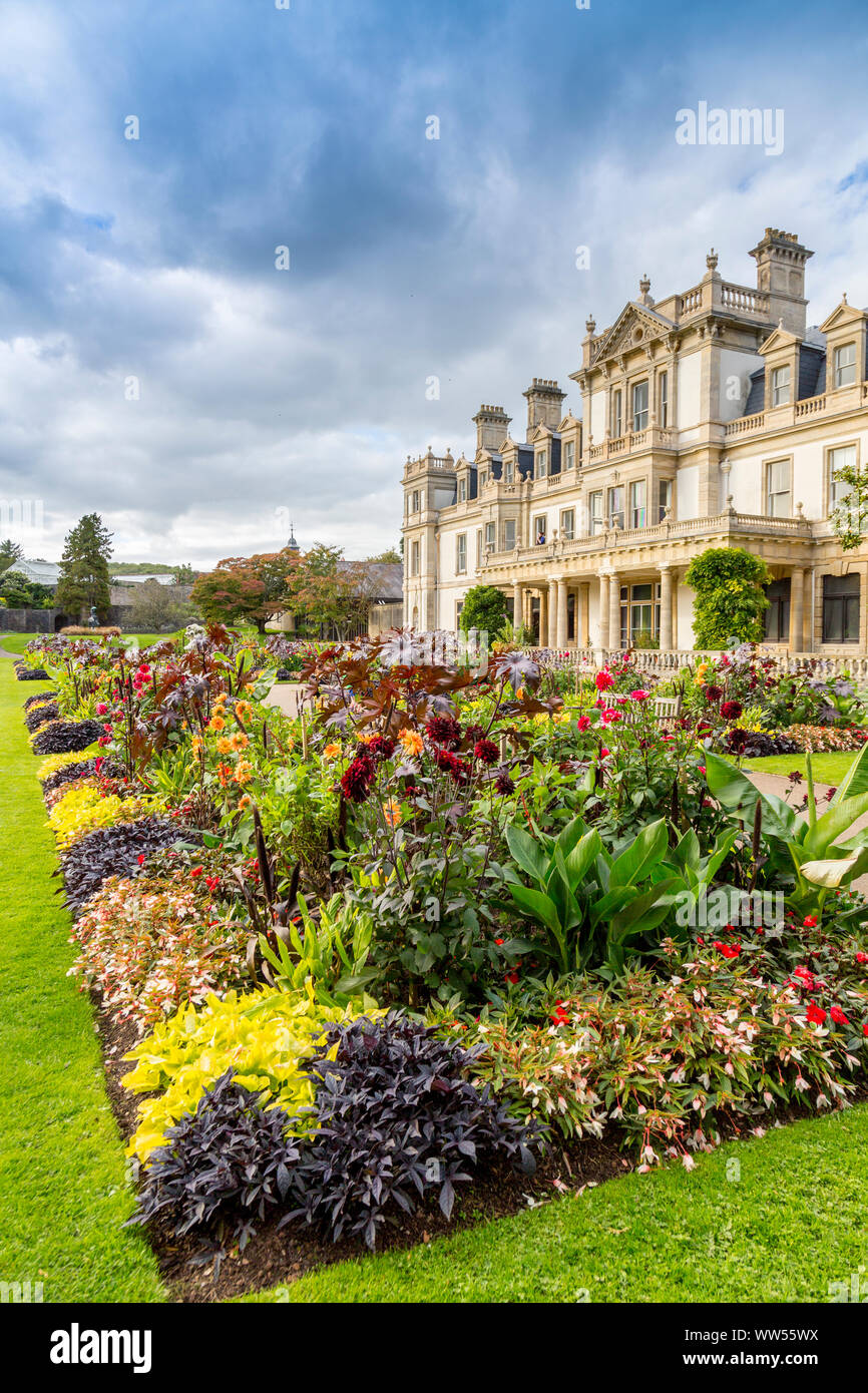 The colourful and well stocked herbaceous borders in front of Dyffryn House in the Grade II Listed Dyffryn Gardens, Vale of Glamorgan, Wales, UK Stock Photo