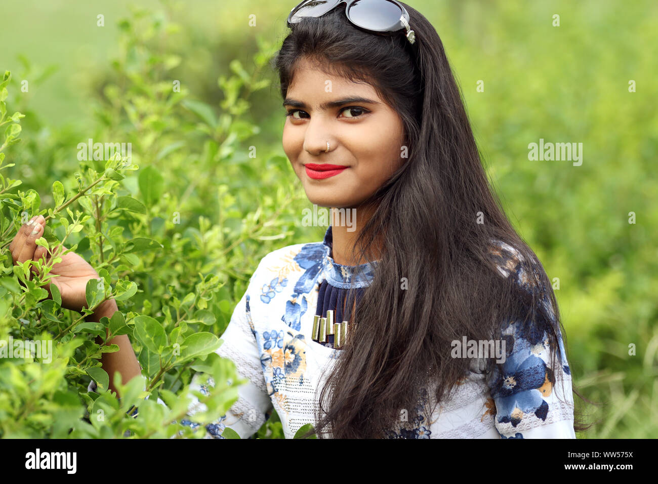 Indian girl with nature hi-res stock photography and images - Alamy