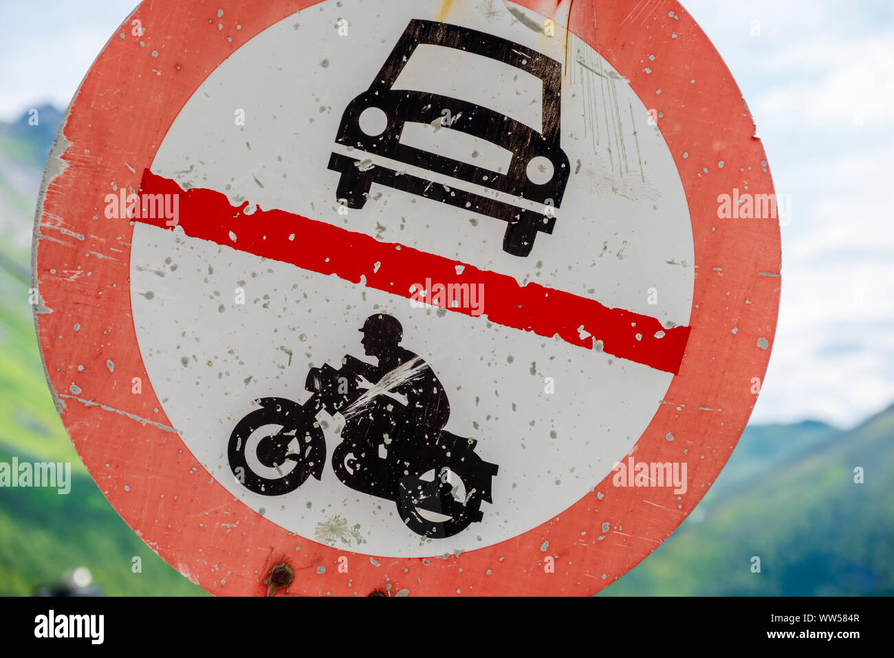 Old-fashioned Trafficsign No permission for Cars and Motorbikes in red, black and white Stock Photo