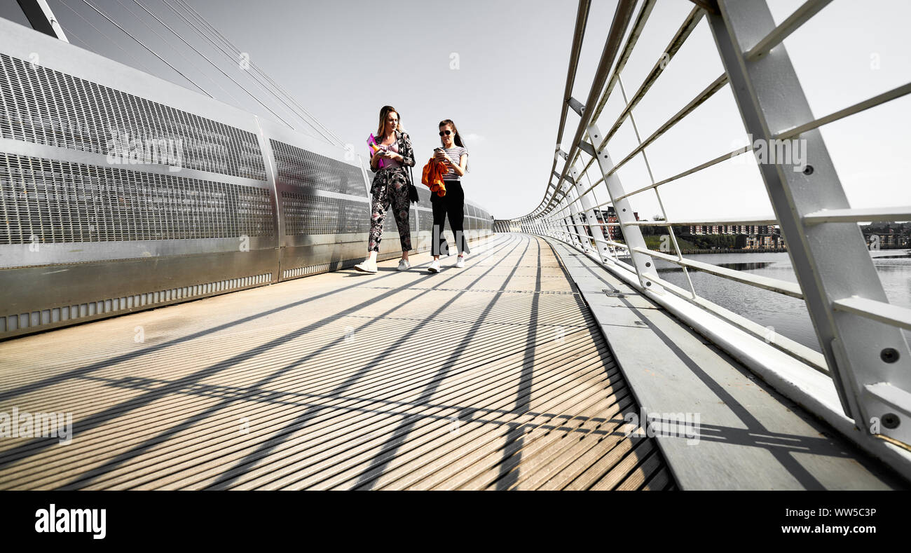 GATESHEAD, ENGLAND, UK MAY 08, 2018 Two young Pedestrians crossing