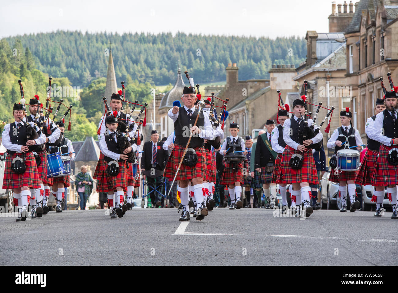 Chieftains Parade along the high street in Peebles. Start of the Peebles highland games. Scottish borders, Scotland Stock Photo