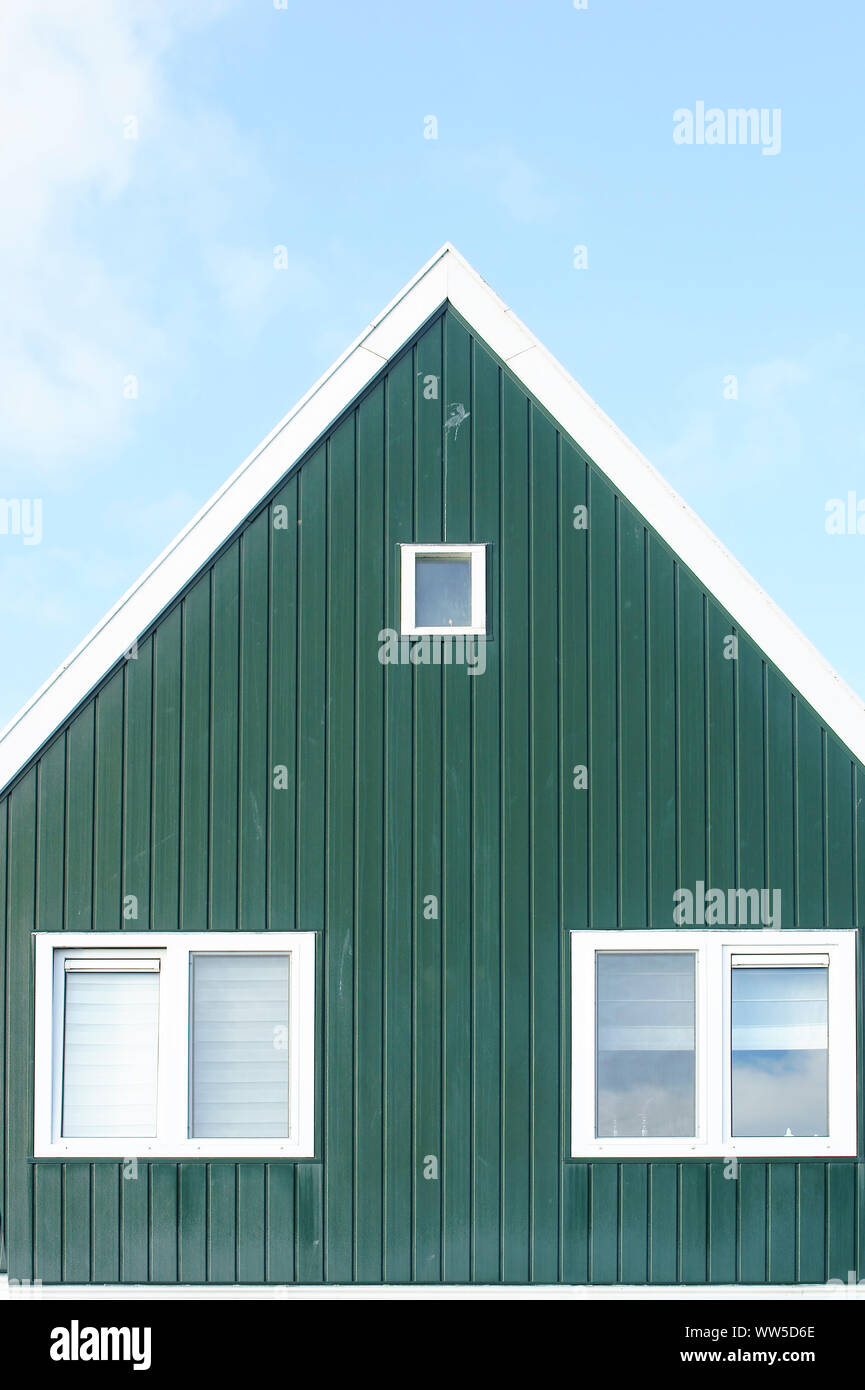 A triangular gable from boards on a Dutch house, Stock Photo