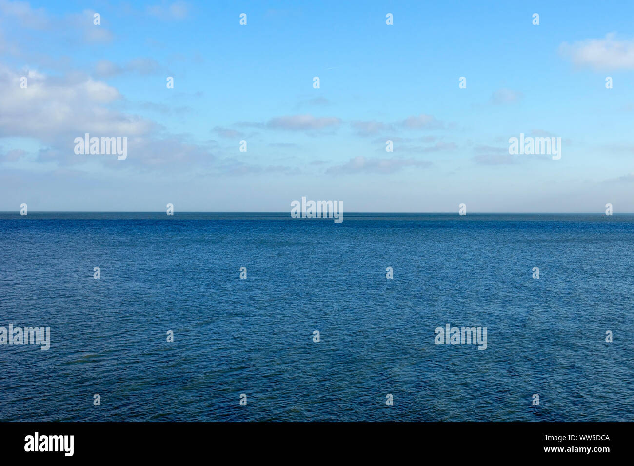 The horizon of a quiet sea in nice weather, Stock Photo