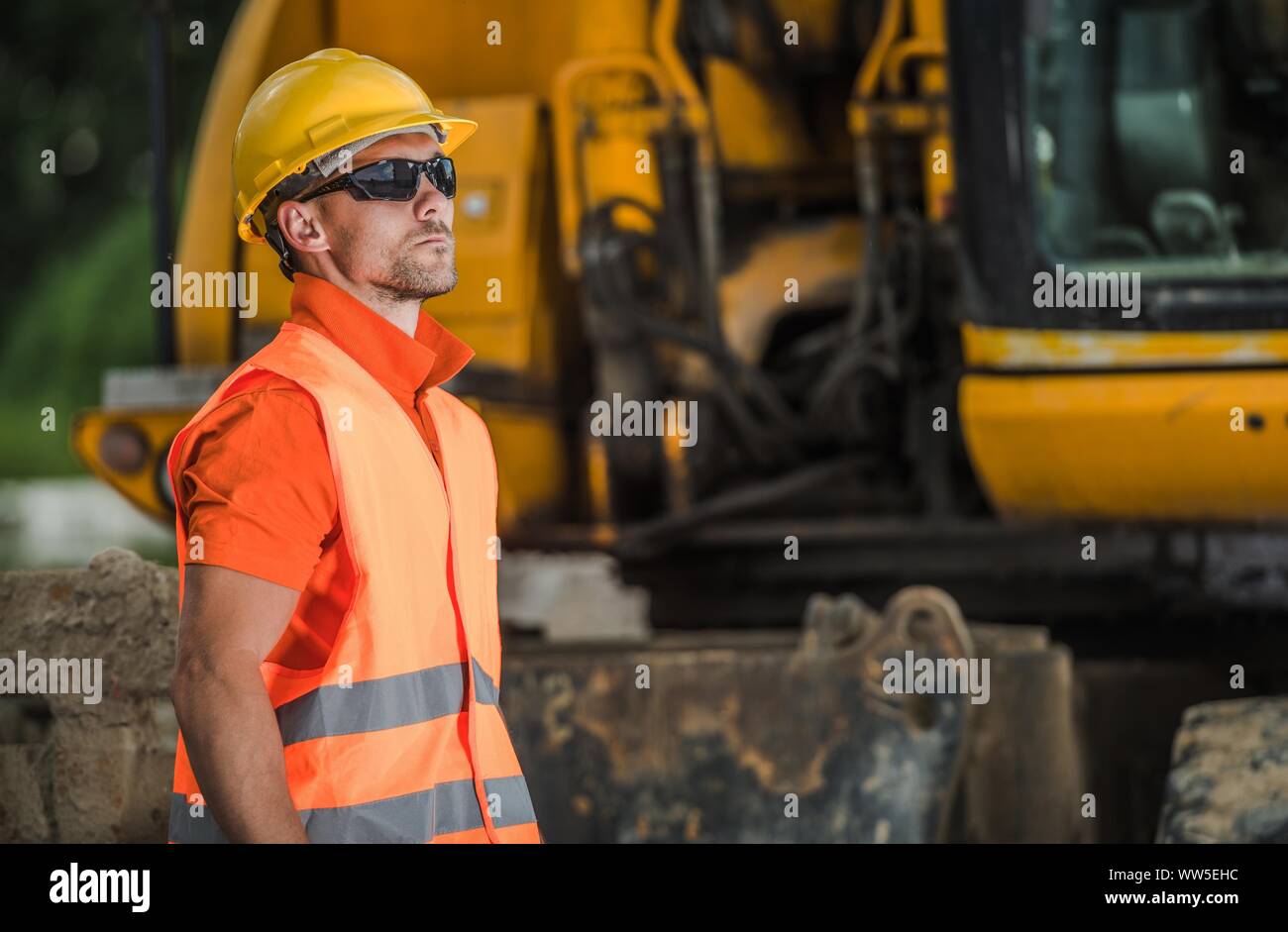 Construction Worker on Duty. Caucasian Men in His 30s Wearing