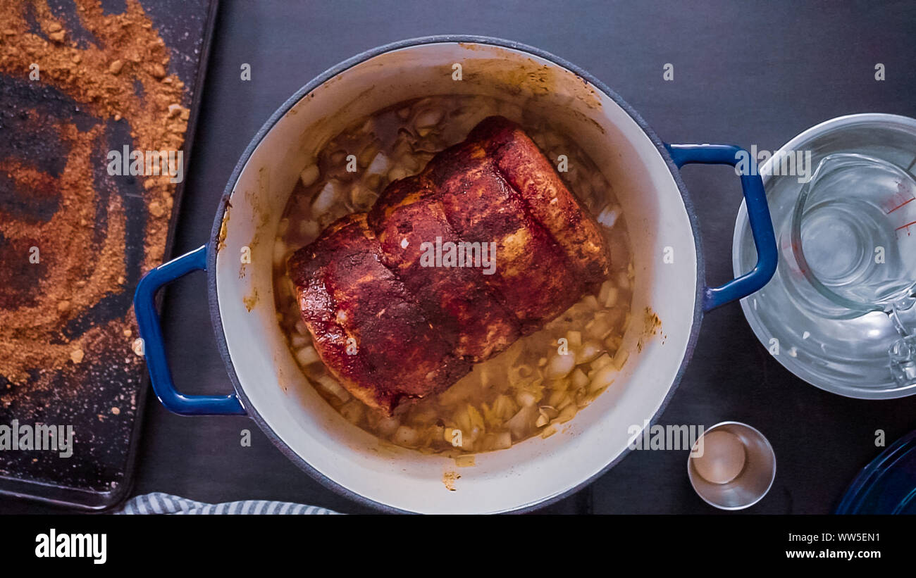 Flat lay. Step by step. Cooking boneless pork roast in cast iron dutch