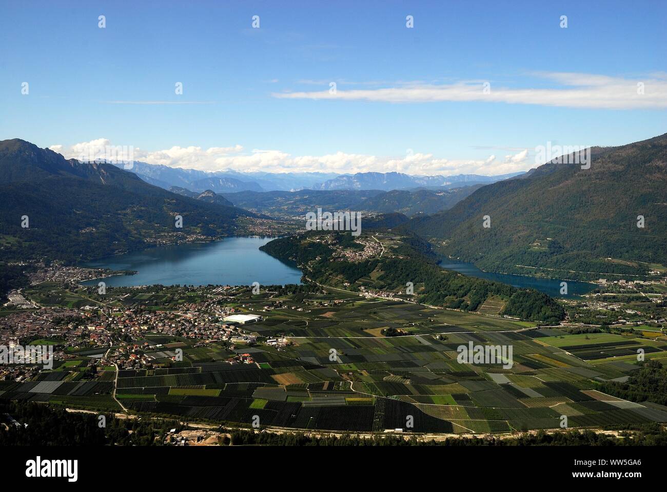 Mount Vezzena, Trentino Alto Adige, Italy. Landscape of Valsugana with the lakes of Levico and Caldonazzo and Caldonazzo town. Stock Photo