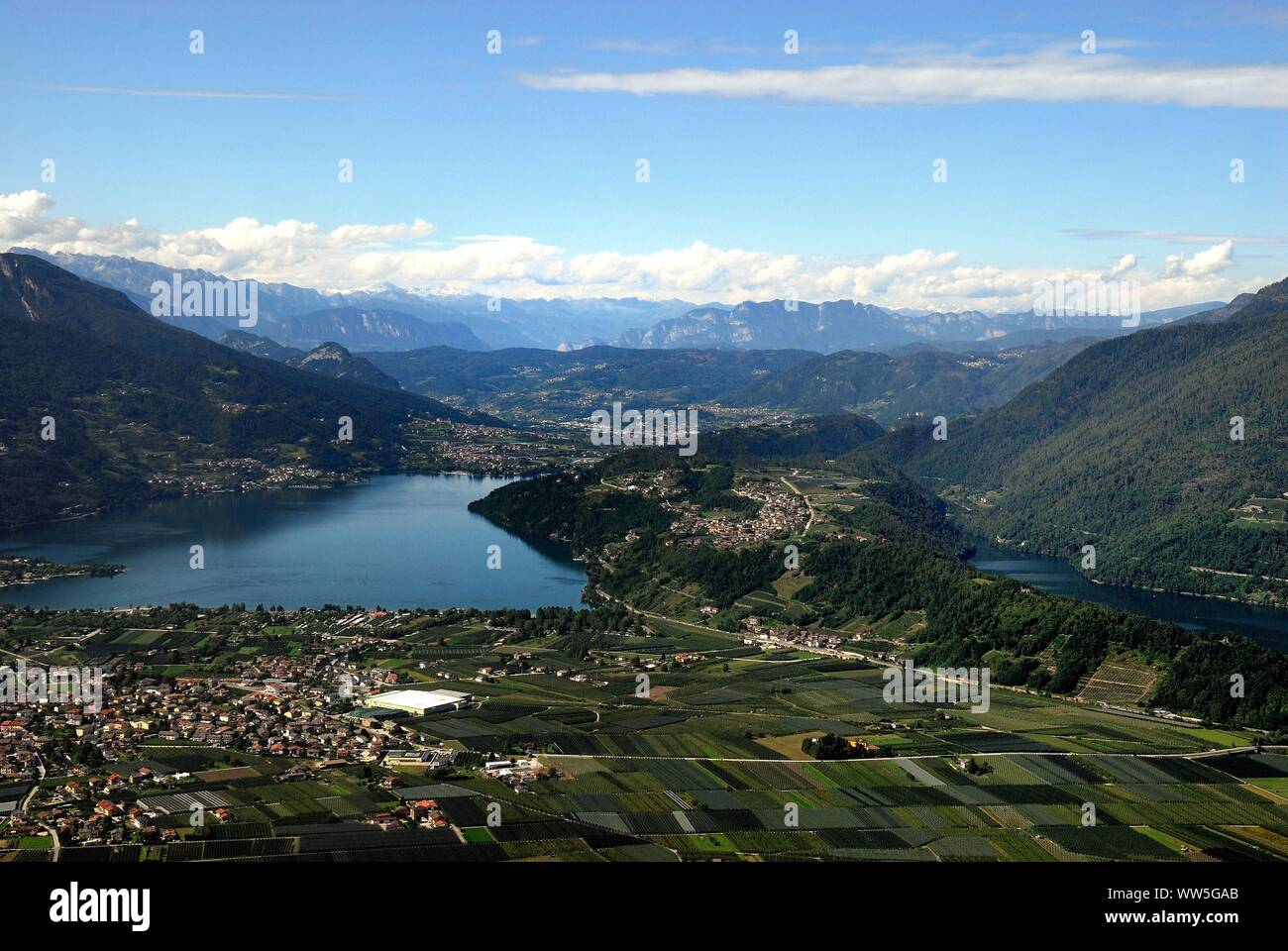 Mount Vezzena, Trentino Alto Adige, Italy. Landscape of Valsugana with the lakes of Levico and Caldonazzo and Caldonazzo town. Stock Photo