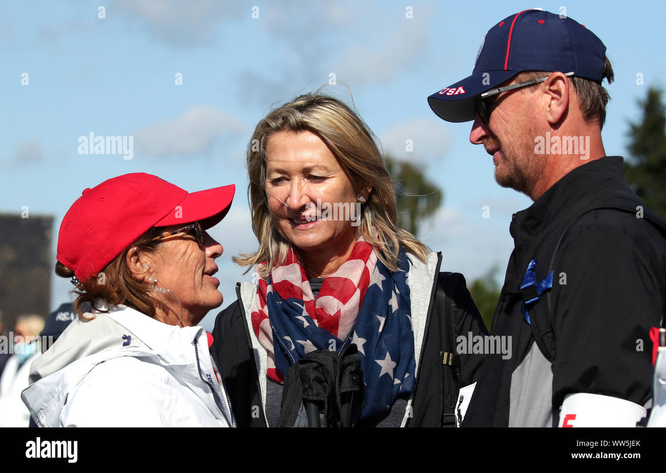 Team USA captain Juli Inkster (left) speaks to Regina and Petr Korda on the  14th, mother