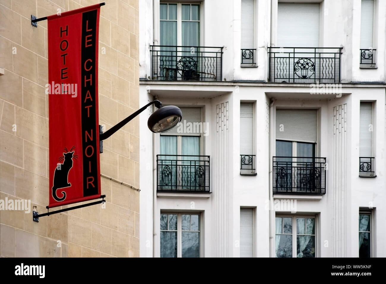 The entrance sign of the hotel Le chat Noir in the famous city district Montmartre in Paris, Stock Photo