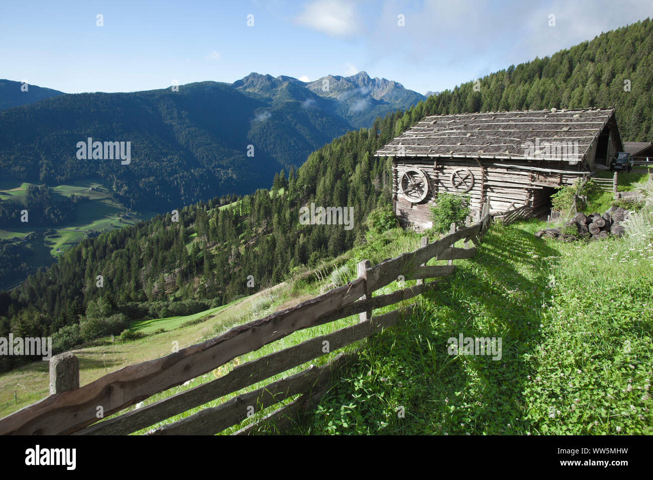 old colorless mountain farm in the Ultental Stock Photo