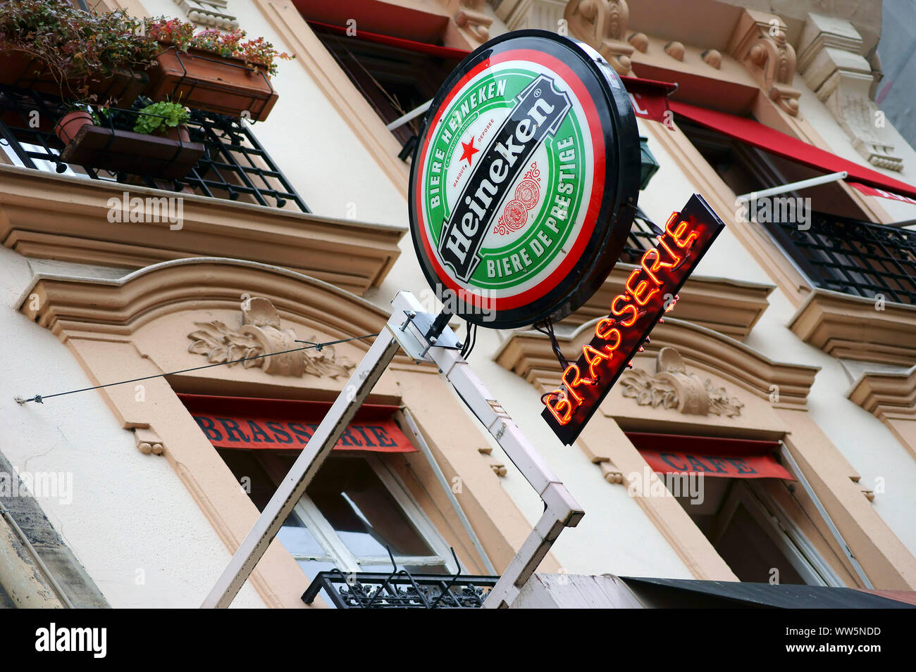 Advertising sign for Heineken beer on the facade of a Brasserie in Paris, Stock Photo