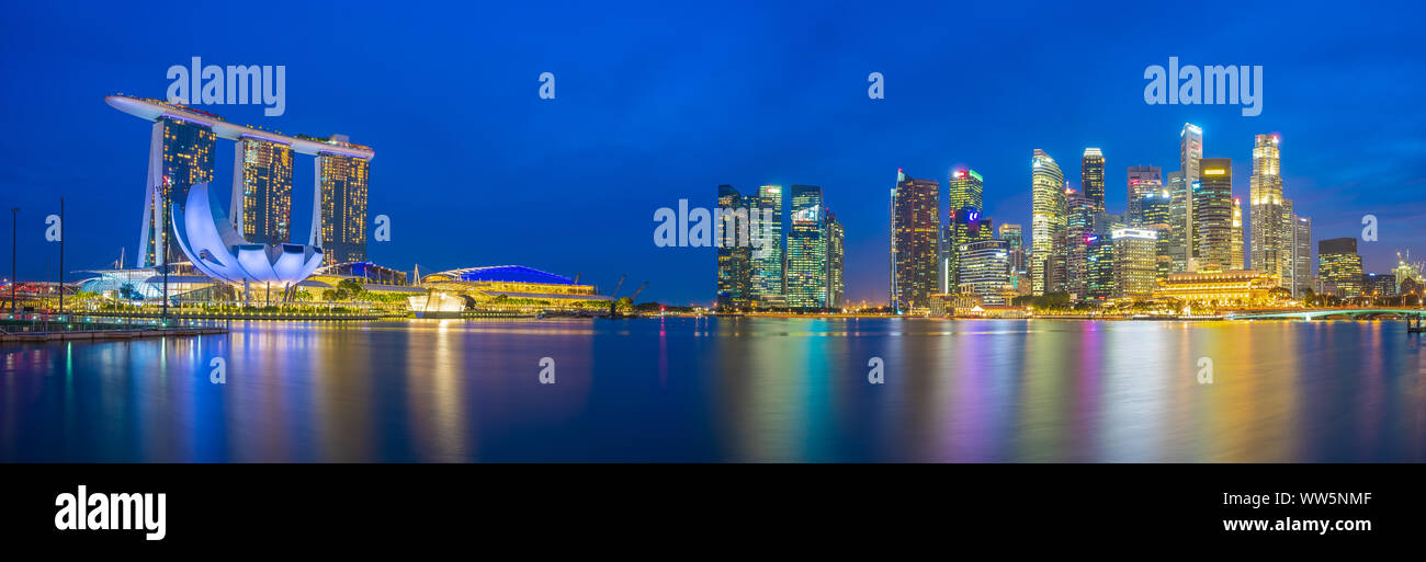 Panorama view of Singapore bay and skyline at night. Stock Photo