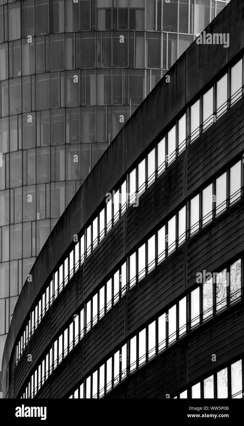 Photography a modern building facade in front of the facade of a high rise, Stock Photo