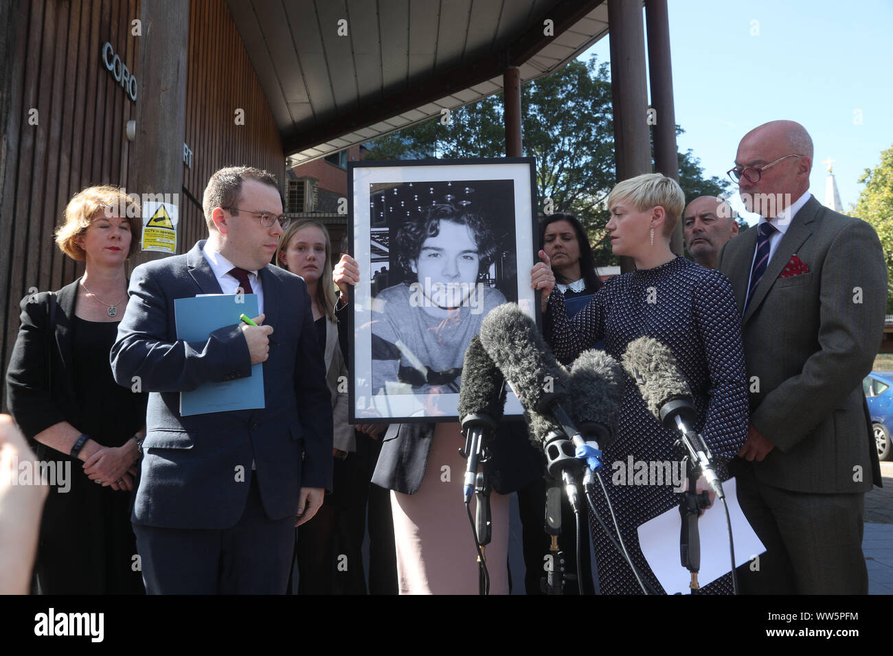 RETRANSMITTING CORRECTING SPELLING OF NAME TO OWEN CAREY The family of Owen  Carey, mother Moira (hidden), sister Emma Kocher (second right) and father  Paul Carey (right), outside Southwark Coroner's Court following the