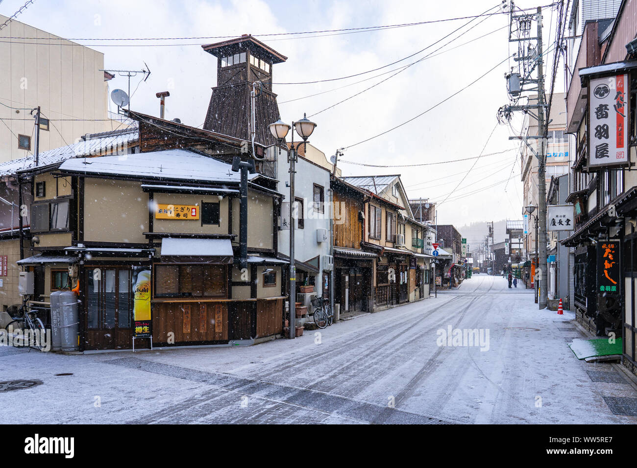 Takayama old town with snow falling in Gifu, Japan. Stock Photo