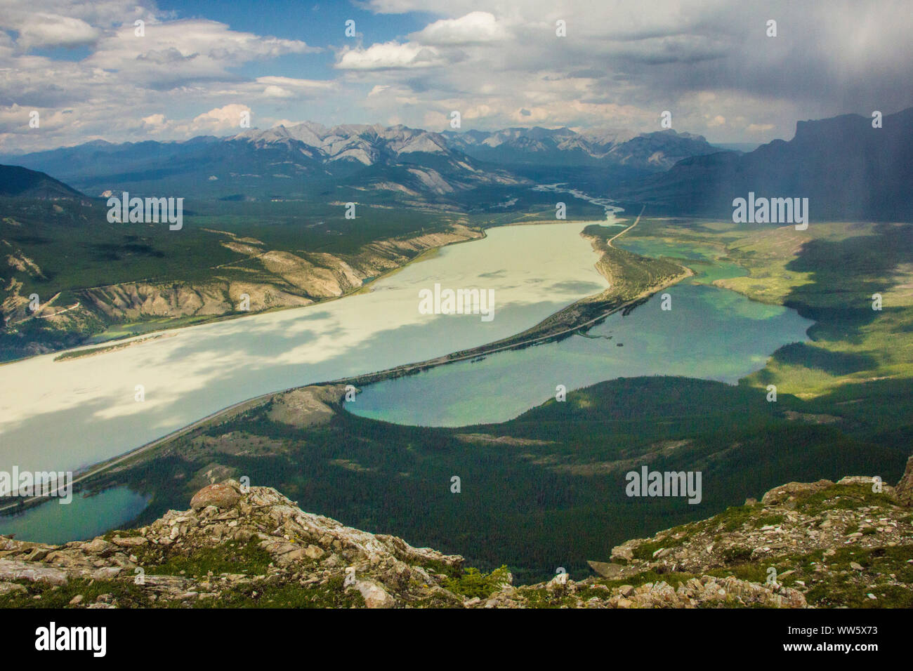 Canada, Rocky Mountains, lakes and rivers in the valley, light and shadow play through the clouds Stock Photo