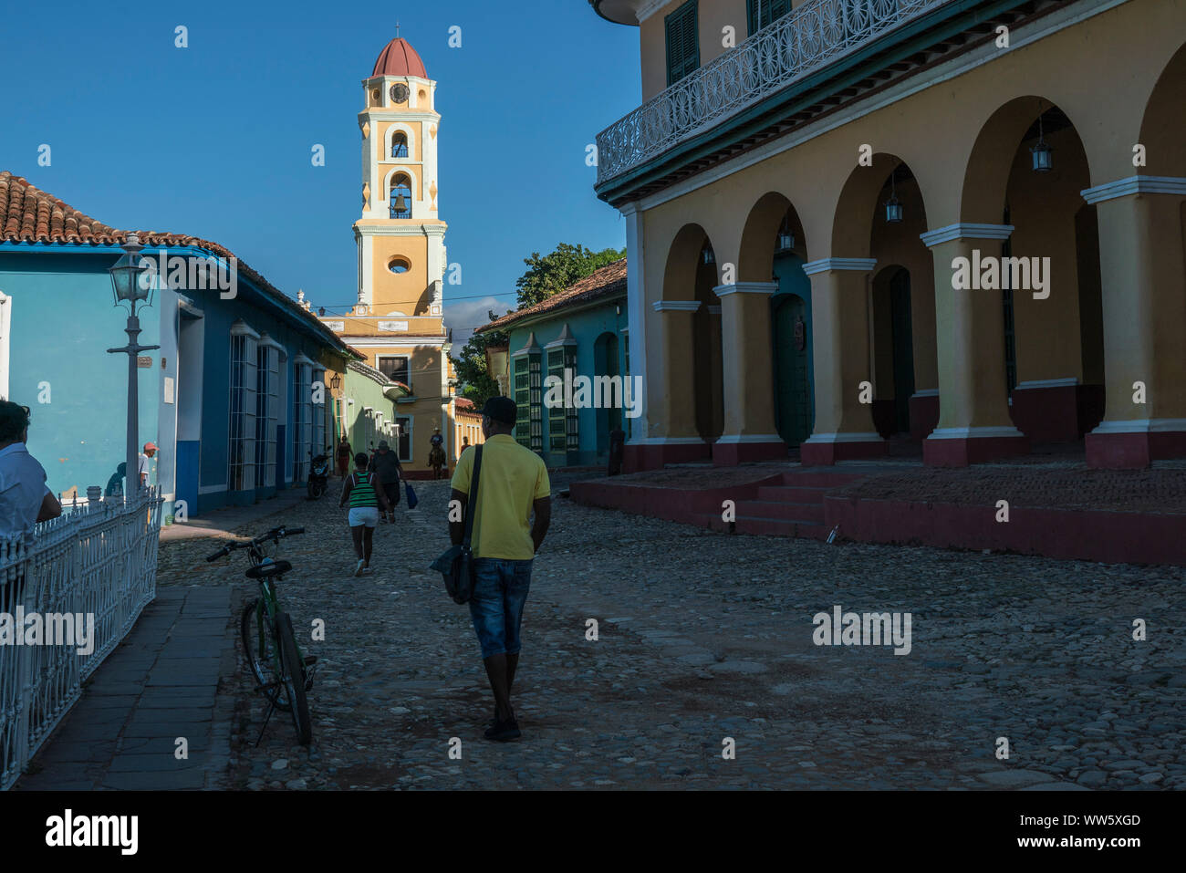 Street with the bell tower of the former monastery of holy Francis of Assisi, Trinidad, Sancti Spiritus, Cuba Stock Photo