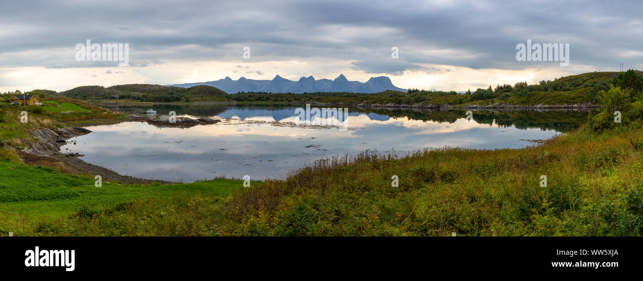 panoramic view, scenery on island Heroywith mountain range seven sisters (syv søstre), Norway,Nordland Stock Photo