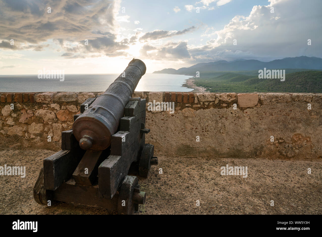 Cannon and view from the fortress of Santiago de Cuba, Castillo San Pedro de la Roca, Cuba Stock Photo