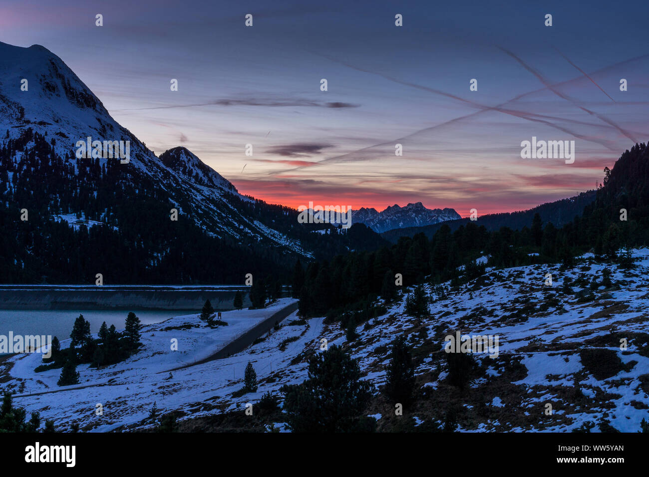 Austria, Tyrol, Sellrain, sundown behind the LÃ¤ngentalspeicher in KÃ¼htai Stock Photo