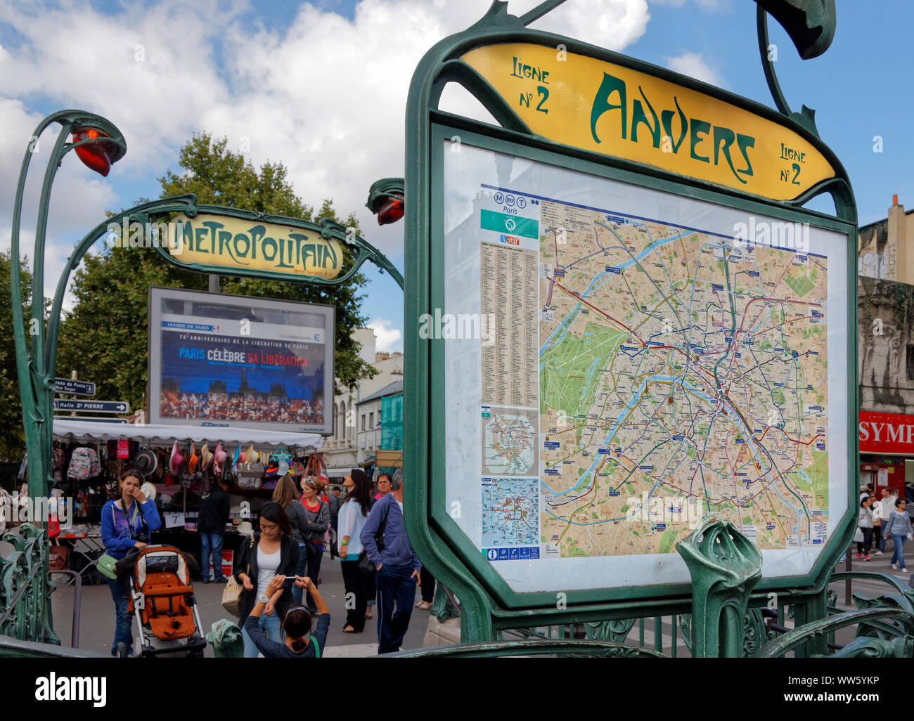 France, Paris, metro plan, signs, Anvers, Metropolitain, art nouveau, people Stock Photo